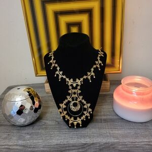 Gold toned and black statement necklace